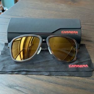 Carrera “aviator” like sunglasses with golden lens